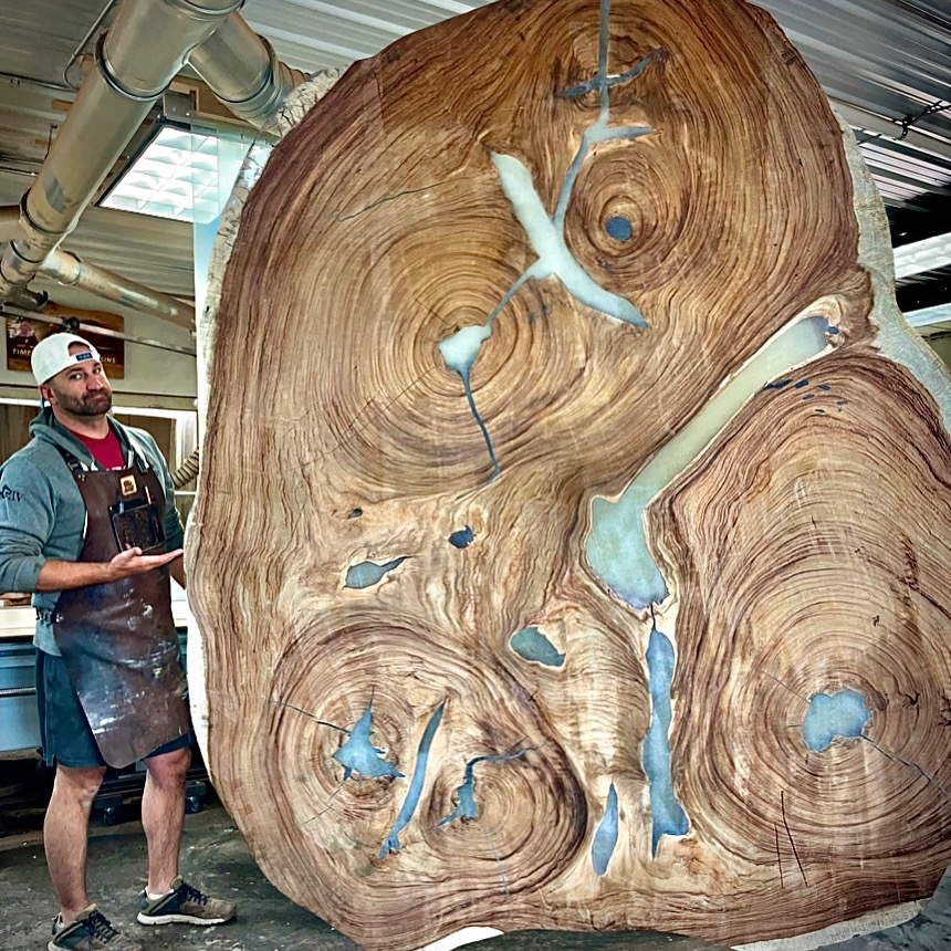 danny with giant tree cut away